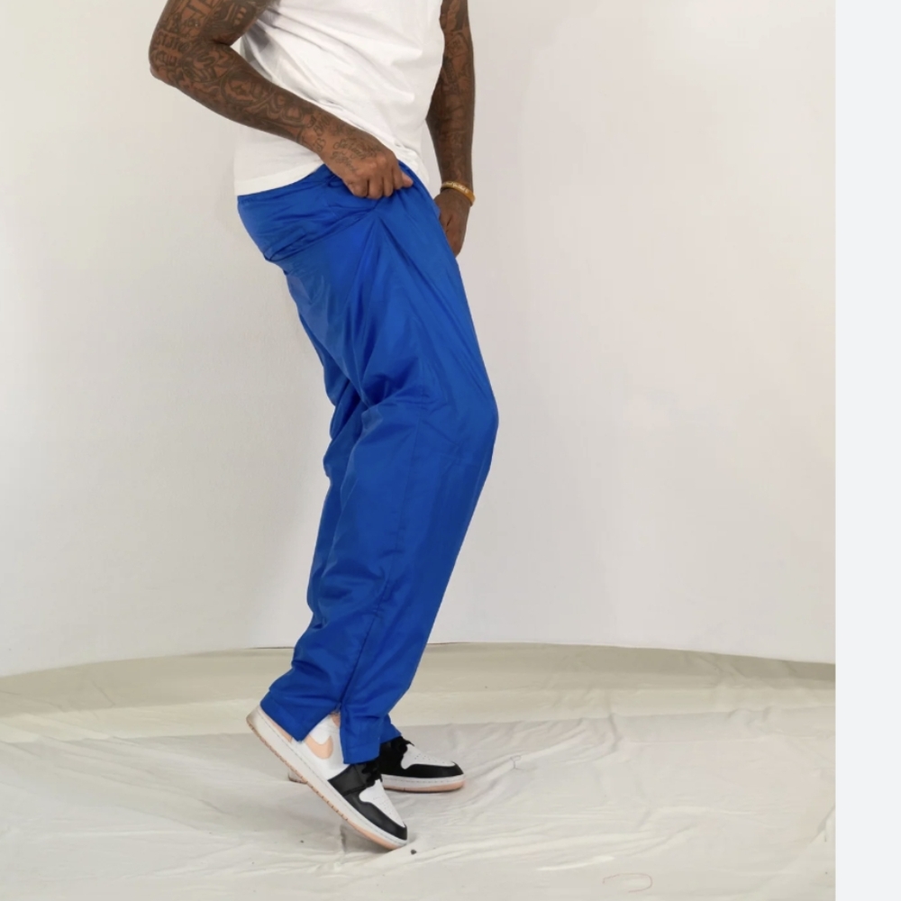 B.W athletic wear mens & women's blue nylon windbreaker pants Sz 8